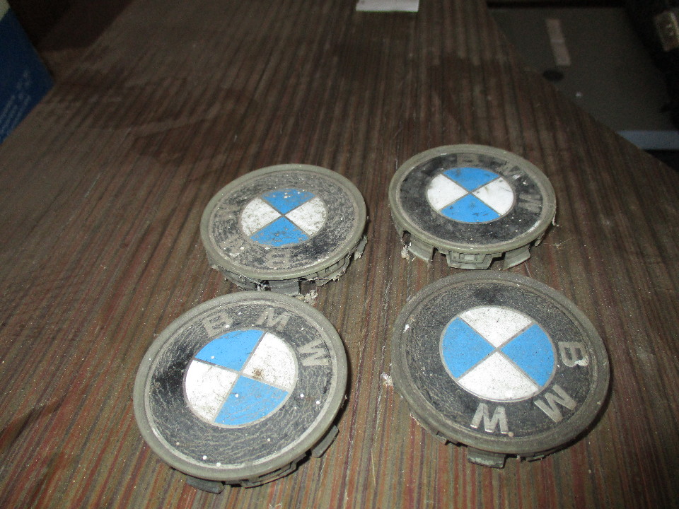 Ковпачки на диски BMW - 4 шт., пластмасові, б/в