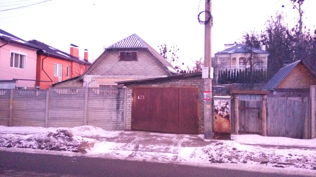 12/100 частин будинку, загальною площею 58.8 кв.м., що розташований за адресою: м. Київ, вул. Красицького, 13
