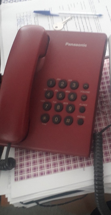 Телефон Panasonic, рожевого кольору
