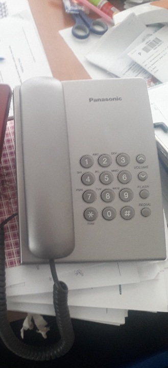 Телефон Panasonic, сірого кольору
