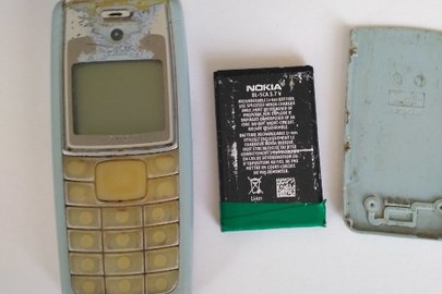 Мобільний телефон "Nokia-1112", ІМЕІ пошкоджено, сірого кольору, має потертості та подряпини, б/в