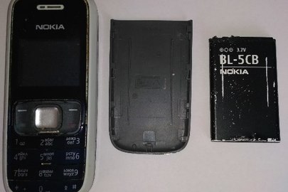 Мобільний телефон "Nokia-1209", ІМЕІ:353543/02/566941/9, з батареєю живлення, має потертості, б/в