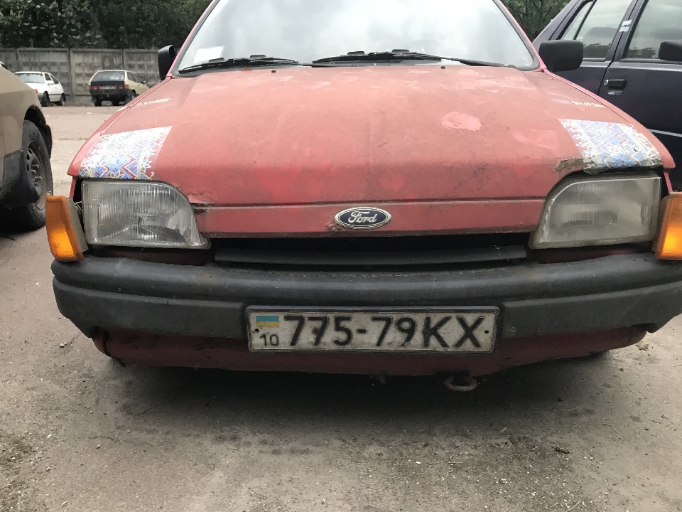 Автомобіль Ford Fiesta, реєстраційний номер 775-79 КХ, номер кузова WF0AXXGAFALR36121, 1990 р.в., червоного кольору 