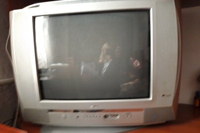 Телевізор LG сірого кольору, в робочому стані, б/в
