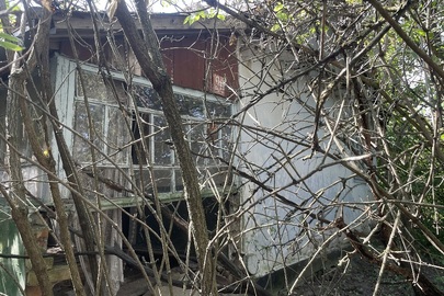 Житловий будинок з надвірними будівлями та спорудами, загальною площею 68,4 кв.м., адреса: Рівненська обл., Рівненський (Гощанський) р., с. Курозвани, вул. Степана Бандери (Суворова), 20