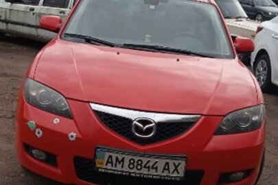 ½ частини автомобіля марки MAZDA 3, 2007 року випуску, червоного кольору, номер кузова JMZBK12Z581596103, реєстраційний номер АМ8844АХ