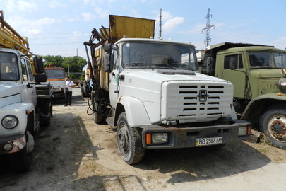 Вантажний автомобіль: КО 431, на шасі ЗИЛ 433362, (сміттєвоз), білого кольору, ДНЗ ВВ2587АМ, 2003 року випуску, VIN: 43336233473228