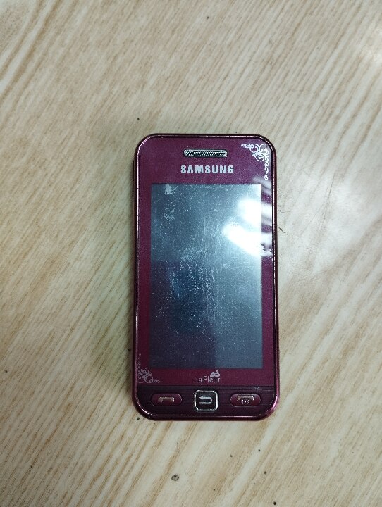 Мобільний телефон кнопковий марки Samsung GTS 5230, червоного кольору, б/в