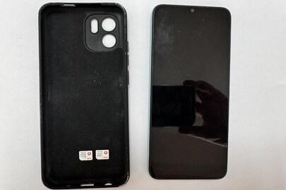 Конфіскація майна за рішенням суду: Мобільний телефон марки «Redmi», модель 220732SC, світлого кольору, б/в