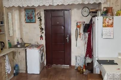 Кімната посімейного, спільного заселення № 153, загальною площею 18.9 кв.м., що знаходиться за адресою: м.Київ, вул. Російська,31