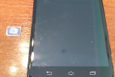 Мобільний телефон марки "Motorola" та сім-карта мобільного оператора "Київстар"