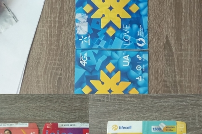 Конфісковане майно за рішенням суду: 6 стартових пакетів (стан б\в) : 2 стартові пакети Vodafone;  3 стартові пакети Київстар: 1 стартовий пакет Lifecell