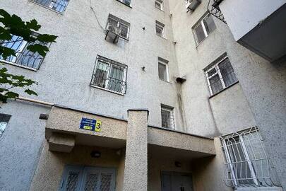 4-кімнатна житлова квартира загальною площею 166,2 кв.м., житловою площею 99,1 кв.м., що розташована за адресою: м.Одеса, Приморський район, вул. Маршала Говорова (у теперішній час - вул. Добровільців), буд. 3, кв.77