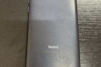 Конфіскація майна за ухвалою суду: мобільний телефон марки Xiaomi Redmi 9, б/в