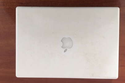 Конфіскація майна за вироком суду: Ноутбук марки «Apple MacBook» білого кольору з зарядним пристроєм, б/в    