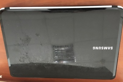 Конфіскація майна за вироком суду: ноутбук марки «SAMSUNG» модель RV508 чорного кольору (відсутні деякі клавіши), та зарядний пристрій APO4214-UV, б/в 