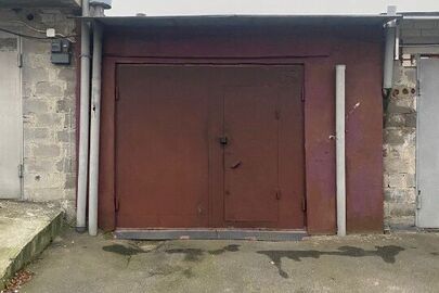 1/2 частина гаражного бокса №279 загальною площею 23,3 кв.м, що розташований за адресою: м.Київ, ГБК "Совки", вул.Святослава Хороброго, 13-А