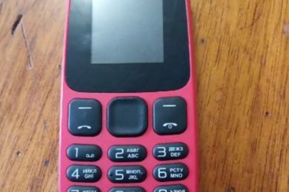 Мобільний телефон марки "NOMI" модель i144c червоного кольору, IMEI №1: 359041100884569, IMEI №2: 359041100884577, б/в