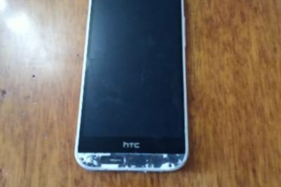 Мобільний телефон марки "НТС" модель ОР6В100 в корпусі сірого кольору, IMEI - встановити немає можливості , б/в