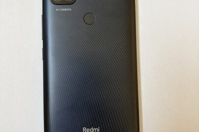 Конфісковане майно за рішенням суду: мобільний телефон Redmi (не вмикається) серійний номер М2006С3МG, чорного кольору, б/в