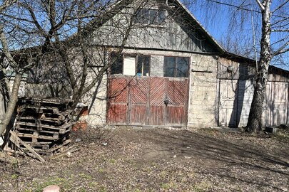 Три нежитлові будівлі, а саме: цех по переробці деревини, слюсарна майстерня, сушка, та земельна ділянка кадастровий номер: 1825455100:06:004:0021, Житомирський район, смт. Пулини, вулиця Набережна, 15