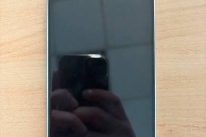 Конфісковане майно за рішенням суду: мобільний телефон "iPhone 12 Pro Max" IMEI 1: 356718115632629, IMEI 2: 35678115228089, б/в