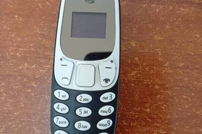 Конфіскація майна згідно рішення суду: мобільний телефон марки "Mini Phone" б/в