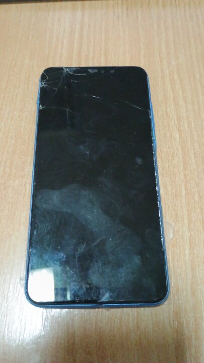 Мобільний телефон марки XIAOMI, темно-синього кольору, б/в