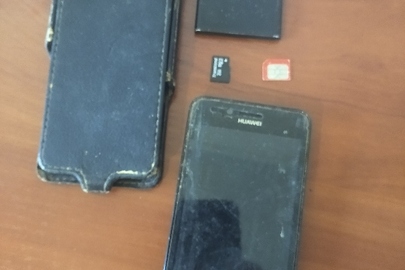 Телефон марки "Huawei" LUA - V22 чорного кольору, сім карта мобільного оператора "Vodafone" із флеш накопичувачем розміром 2(два) GB та чохол до телефону чорного кольору б/в