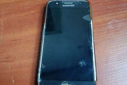 Конфісковане майно за рішенням суду: мобільний телефон марки "Samsung", модель "Galaxy J5 (SM-J500FN)" з чохлом-накладкою, б/в