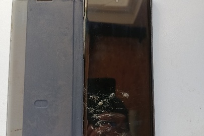 Конфісковане майно за рішенням суду: Мобільний телефон марки "Samsung", модель "Galaxy Note 10+ (SM-N9750)" сенсорний з чохлом-накладкою, б/в