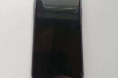 Конфісковане майно за рішенням суду: Мобільний телефон “iPhone X”, сенсорний, білого кольору,  із чохлом-накладкою чорного кольору, б/в