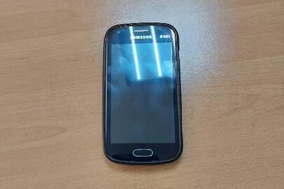 Мобільний телефон Samsung чорного кольору, марки «GT-S7562/SEK» із силіконовим чохлом, б/в