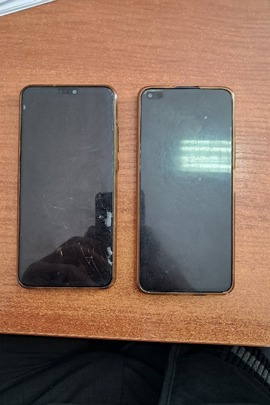 Конфіскація майна за рішенням суду: два мобільні телефони марки HUAWEI та HONOR з сім картами, б/в