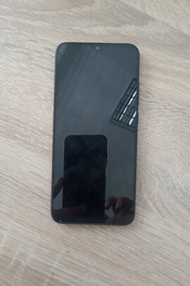Конфіскація майна за ухвалою суду: мобільний телефон «Xiaomi Redmi 9C», б/в.