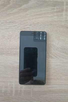 Конфіскація майна за ухвалою суду: мобільний телефон и Redmi Note 4, б/в, телефон з сім-картою.