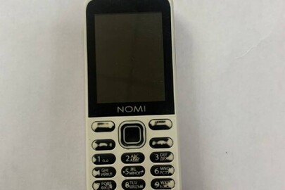 Мобільний телефон марки "Nomi 1244" IMEI 1:354980080793511, IMEI 2: 354980080793529, в якому знаходиться картка пам'яті об'ємом 1Гб та сім картка оператора мобільного зв'язку "Київстар", б/в