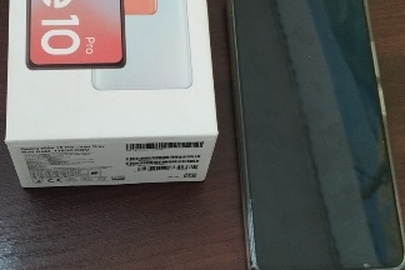 Конфісковане майно за рішенням суду: коробка з мобільним телефоном марки «Redmi Note 10 Pro», серійний номер: 31117/K1T409078, IMEI: 864382057865583, 864382057865591, з зарядним пристроєм та USB-кабелем, нове