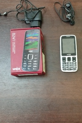 Конфісковане майно за рішенням суду: коробка з мобільним телефоном марки «Verico-B 241», серійний номер: V1901024003254, IMEI: 344530091699874, 354530091699882, із зарядним пристроєм та навушниками, нове