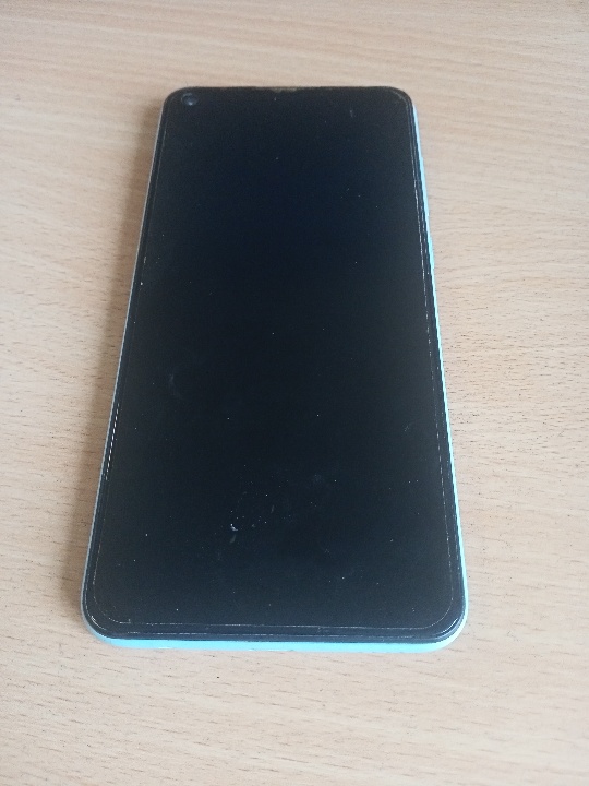 Мобільний телефон марки «Redmi», бірюзового кольору б/в