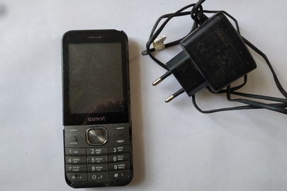 Мобільний телефон марки "G Smart F 280" із зарядним пристроєм марки "Nokia"