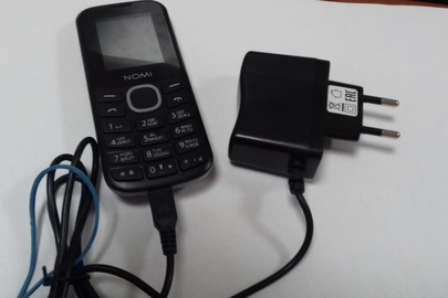 Мобільний телефон марки "Nomi" із зарядним пристроєм б/у