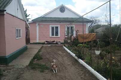 1/2 житлового будинку, загальною площею 65,2 кв.м., що знаходиться за адресою: Миколаївська область, Первомайський район, смт. Криве Озеро, вул. Центральна, 167