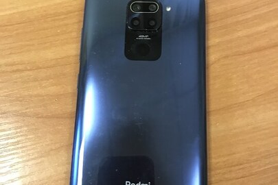 Конфісковане майно за рішенням суду: мобільний телефон марки " Redmi", моделі " М2003JI15SG", з IMEI 1: 863048059234745, IMEI 2: 863048059234745, б/в