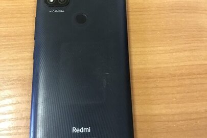 Конфіскація майна за рішенням суду:мобільний телефон марки " Redmi ", у корпусі чорного кольору,б/в