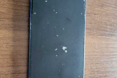 Конфіскація майна за вироком суду: мобільний телефон  марки iPhone 12, IMEI 2 353888103286135, б/в