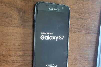 Конфіскація майна за вироком суду: мобільний телефон марки  «Samsung Galaxy S7» в корпусі чорно-сірого кольору, imei 358991072732710/01 та imei 35899107273271, б/в