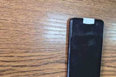 Конфіскація майна за вироком суду: мобільний телефон марки "Redmi Note 12" IMEI 1: 869146068870584, IMEI 2: 869146068870592, б/в