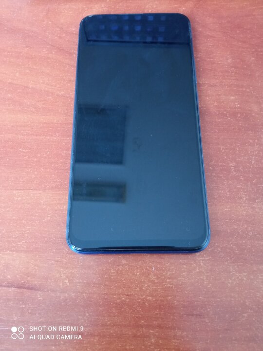 Мобільний телефон марки Huawei синього кольору б/в