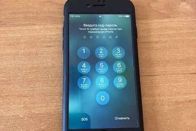 Мобільний телефон марки Iphone 7 в корпусі сірого кольору, без зарядного пристрою, в заблокованому стані, б/в
